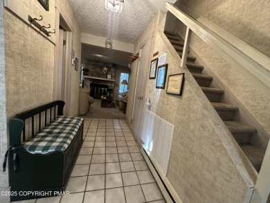 Welcome to 844 Crest Pine Lane - a charming 3-bedroom, 2.5 bath on Pinecrest Lake Golf and Country Club in Pennsylvania - for sale on GolfHomes.com, golf home, golf lot