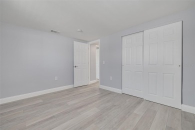 This COMPLETELY Remodeled home is in the waterfront community of on Gulf Harbors Golf Course in Florida - for sale on GolfHomes.com, golf home, golf lot