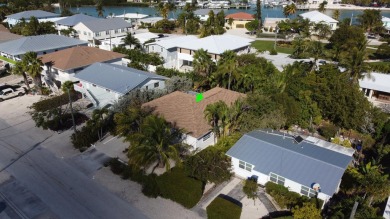 Convenient, spacious and private are many of the words used to on Key Colony Beach Golf Course in Florida - for sale on GolfHomes.com, golf home, golf lot