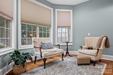 Anchoring a prominent corner lot in Woodbridge North, this on Woodbridge Golf Links in North Carolina - for sale on GolfHomes.com, golf home, golf lot