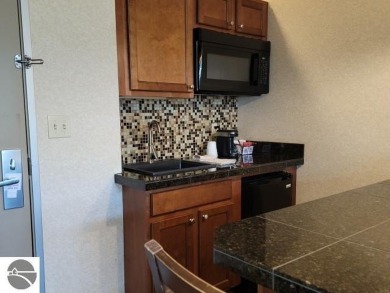 Need a place to call your own for overnight stays?  The Lodge at on Cedar River Golf Course in Michigan - for sale on GolfHomes.com, golf home, golf lot