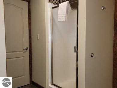 Need a place to call your own for overnight stays?  The Lodge at on Cedar River Golf Course in Michigan - for sale on GolfHomes.com, golf home, golf lot