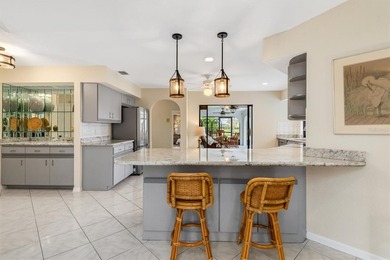 Spectacular mini estate lakefront, pool home offering 3 bedrooms on Deep Creek Golf Club in Florida - for sale on GolfHomes.com, golf home, golf lot