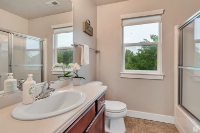Directly off the kitchen leads to a PRIVATE cover patio, with no on Schneiters Pebble Brook Golf Course in Utah - for sale on GolfHomes.com, golf home, golf lot