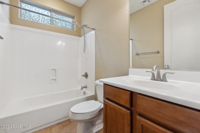 RARE FIND!  This 4 bedroom home offers 2 bedrooms, 2 bathrooms on Prescott Lakes Golf and Country Club in Arizona - for sale on GolfHomes.com, golf home, golf lot