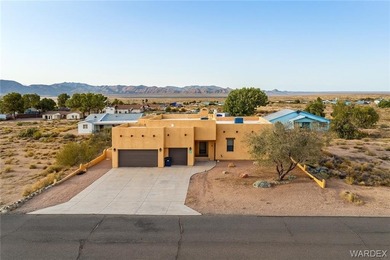 This HOME has majestic panoramic views of the Cerbat, Hualapai on Valle Vista Golf Course in Arizona - for sale on GolfHomes.com, golf home, golf lot