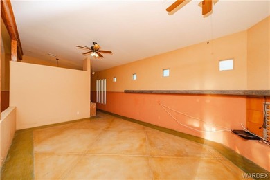 This HOME has majestic panoramic views of the Cerbat, Hualapai on Valle Vista Golf Course in Arizona - for sale on GolfHomes.com, golf home, golf lot