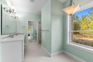 Large, single-level, pond-front home full of natural lighting on Meadowcreek Golf Resort in Idaho - for sale on GolfHomes.com, golf home, golf lot