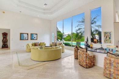 This 4-bedroom + office home is located on a private cul-de-sac on St. Andrews Country Club of Boca Raton in Florida - for sale on GolfHomes.com, golf home, golf lot