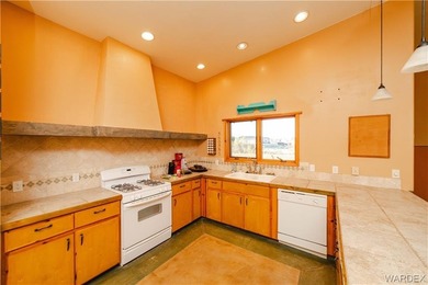 This HOME has majestic panoramic views of the Cerbat, Hualapai on Valle Vista Golf Course in Arizona - for sale on GolfHomes.com, golf home, golf lot