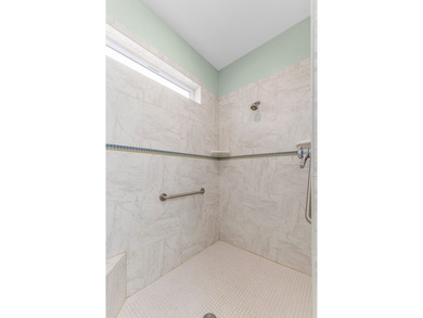 Large, single-level, pond-front home full of natural lighting on Meadowcreek Golf Resort in Idaho - for sale on GolfHomes.com, golf home, golf lot