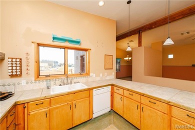 This HOME has majestic panoramic views of the Cerbat, Hualapai on Valle Vista Golf Course in Arizona - for sale on GolfHomes.com, golf home, golf lot