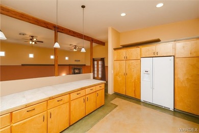 This HOME has majestic panoramic views of the Cerbat, Hualapai on Valle Vista Golf Course in Arizona - for sale on GolfHomes.com, golf home, golf lot