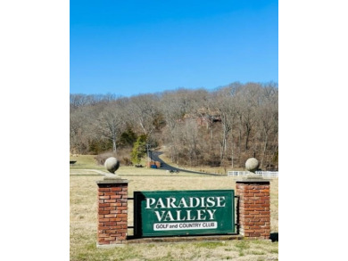 Stunning 3+ wooded acres over looking the fairway of the on Paradise Valley Country Club in Missouri - for sale on GolfHomes.com, golf home, golf lot