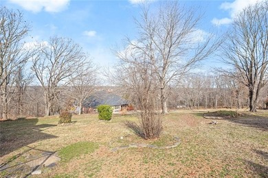 Well built, well maintained home in an incredible location! .27 on Bella Vista Country Club - Scottsdale in Arkansas - for sale on GolfHomes.com, golf home, golf lot