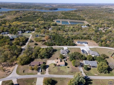 Discover this delightful home with picturesque views of the on Lake Perry Country Club in Kansas - for sale on GolfHomes.com, golf home, golf lot