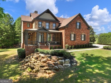 Welcome home to 70 Baker Pond Ct - a rare and timeless retreat on Traditions of Braselton Golf Club in Georgia - for sale on GolfHomes.com, golf home, golf lot