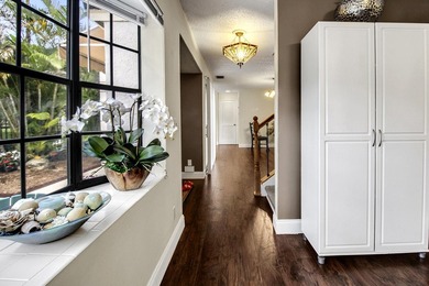 Beautifully maintained 2-story patio home in Prestwick Chase on PGA National Golf Club in Florida - for sale on GolfHomes.com, golf home, golf lot