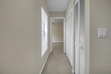 Welcome to 386-3 Prestwick Circle in Prestwick Chase, a on PGA National Golf Club in Florida - for sale on GolfHomes.com, golf home, golf lot