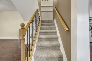 Beautifully maintained 2-story patio home in Prestwick Chase on PGA National Golf Club in Florida - for sale on GolfHomes.com, golf home, golf lot