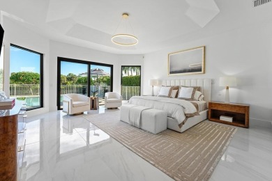 Experience luxury living in this beautifully renovated on Bocaire Country Club in Florida - for sale on GolfHomes.com, golf home, golf lot