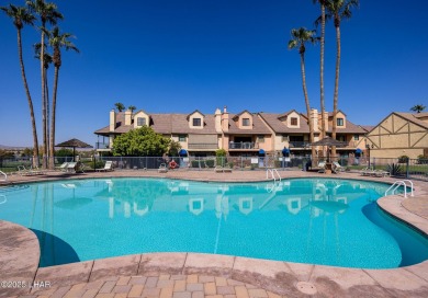 This lovely condo is located by the lakeside and is just a short on London Bridge Golf Course in Arizona - for sale on GolfHomes.com, golf home, golf lot