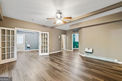 Freshly painted interior and brand-new carpet throughout! Escape on The Highlands Course at Lake Arrowhead in Georgia - for sale on GolfHomes.com, golf home, golf lot