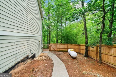 Freshly painted interior and brand-new carpet throughout! Escape on The Highlands Course at Lake Arrowhead in Georgia - for sale on GolfHomes.com, golf home, golf lot