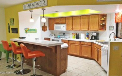 This stunning furnished 2-bedroom, 2-bath condo in Residential on London Bridge Golf Course in Arizona - for sale on GolfHomes.com, golf home, golf lot