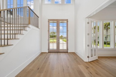 Welcome to the epitome of luxury living with this stunning new on Regatta Bay Golf and Country Club in Florida - for sale on GolfHomes.com, golf home, golf lot