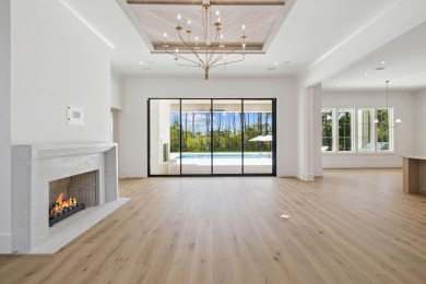 Welcome to the epitome of luxury living with this stunning new on Regatta Bay Golf and Country Club in Florida - for sale on GolfHomes.com, golf home, golf lot