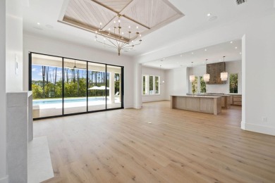 Welcome to the epitome of luxury living with this stunning new on Regatta Bay Golf and Country Club in Florida - for sale on GolfHomes.com, golf home, golf lot