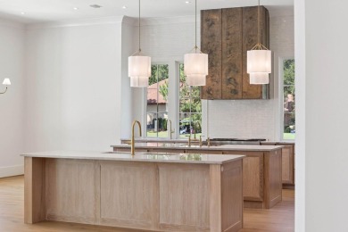 Welcome to the epitome of luxury living with this stunning new on Regatta Bay Golf and Country Club in Florida - for sale on GolfHomes.com, golf home, golf lot