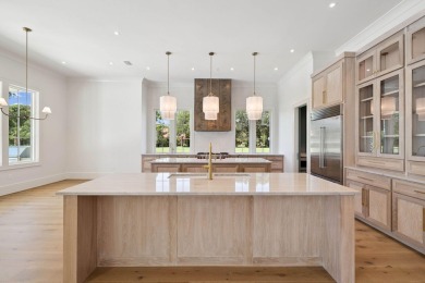 Welcome to the epitome of luxury living with this stunning new on Regatta Bay Golf and Country Club in Florida - for sale on GolfHomes.com, golf home, golf lot