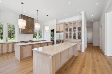 Welcome to the epitome of luxury living with this stunning new on Regatta Bay Golf and Country Club in Florida - for sale on GolfHomes.com, golf home, golf lot