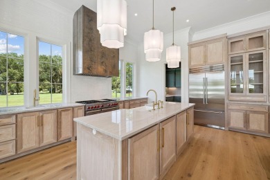 Welcome to the epitome of luxury living with this stunning new on Regatta Bay Golf and Country Club in Florida - for sale on GolfHomes.com, golf home, golf lot
