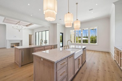 Welcome to the epitome of luxury living with this stunning new on Regatta Bay Golf and Country Club in Florida - for sale on GolfHomes.com, golf home, golf lot
