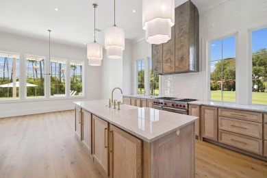 Welcome to the epitome of luxury living with this stunning new on Regatta Bay Golf and Country Club in Florida - for sale on GolfHomes.com, golf home, golf lot
