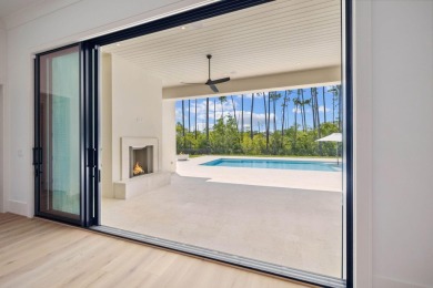 Welcome to the epitome of luxury living with this stunning new on Regatta Bay Golf and Country Club in Florida - for sale on GolfHomes.com, golf home, golf lot
