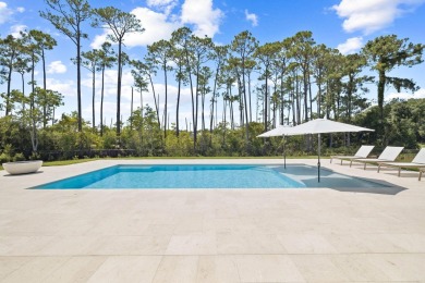 Welcome to the epitome of luxury living with this stunning new on Regatta Bay Golf and Country Club in Florida - for sale on GolfHomes.com, golf home, golf lot