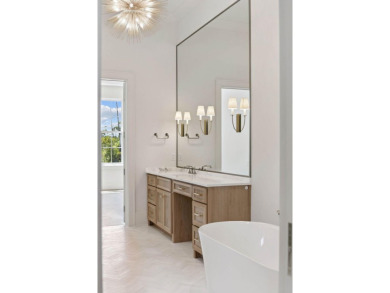 Welcome to the epitome of luxury living with this stunning new on Regatta Bay Golf and Country Club in Florida - for sale on GolfHomes.com, golf home, golf lot