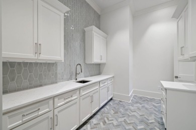 Welcome to the epitome of luxury living with this stunning new on Regatta Bay Golf and Country Club in Florida - for sale on GolfHomes.com, golf home, golf lot