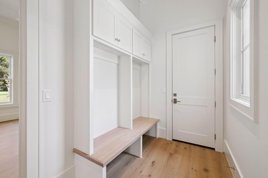 Welcome to the epitome of luxury living with this stunning new on Regatta Bay Golf and Country Club in Florida - for sale on GolfHomes.com, golf home, golf lot