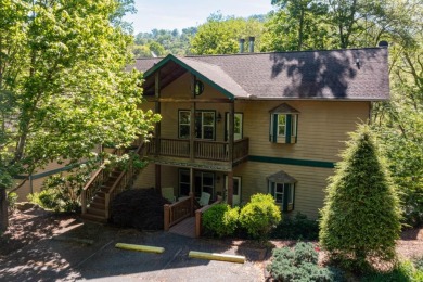 Discover the luxury of waterfront living in Western North on Smoky Mountain Country Club in North Carolina - for sale on GolfHomes.com, golf home, golf lot