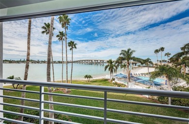 MILLION DOLLAR VIEW.. PRIVATE COMMUNITY BEACH.. FULLY UPDATED on Isla Del Sol Yacht and Country Club in Florida - for sale on GolfHomes.com, golf home, golf lot