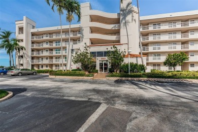 MILLION DOLLAR VIEW.. PRIVATE COMMUNITY BEACH.. FULLY UPDATED on Isla Del Sol Yacht and Country Club in Florida - for sale on GolfHomes.com, golf home, golf lot