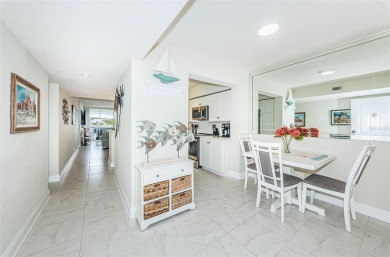 MILLION DOLLAR VIEW.. PRIVATE COMMUNITY BEACH.. FULLY UPDATED on Isla Del Sol Yacht and Country Club in Florida - for sale on GolfHomes.com, golf home, golf lot