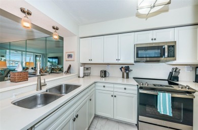 MILLION DOLLAR VIEW.. PRIVATE COMMUNITY BEACH.. FULLY UPDATED on Isla Del Sol Yacht and Country Club in Florida - for sale on GolfHomes.com, golf home, golf lot