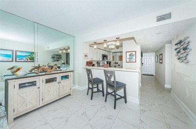 MILLION DOLLAR VIEW.. PRIVATE COMMUNITY BEACH.. FULLY UPDATED on Isla Del Sol Yacht and Country Club in Florida - for sale on GolfHomes.com, golf home, golf lot