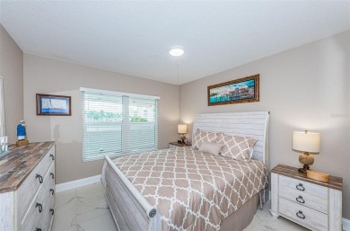 MILLION DOLLAR VIEW.. PRIVATE COMMUNITY BEACH.. FULLY UPDATED on Isla Del Sol Yacht and Country Club in Florida - for sale on GolfHomes.com, golf home, golf lot